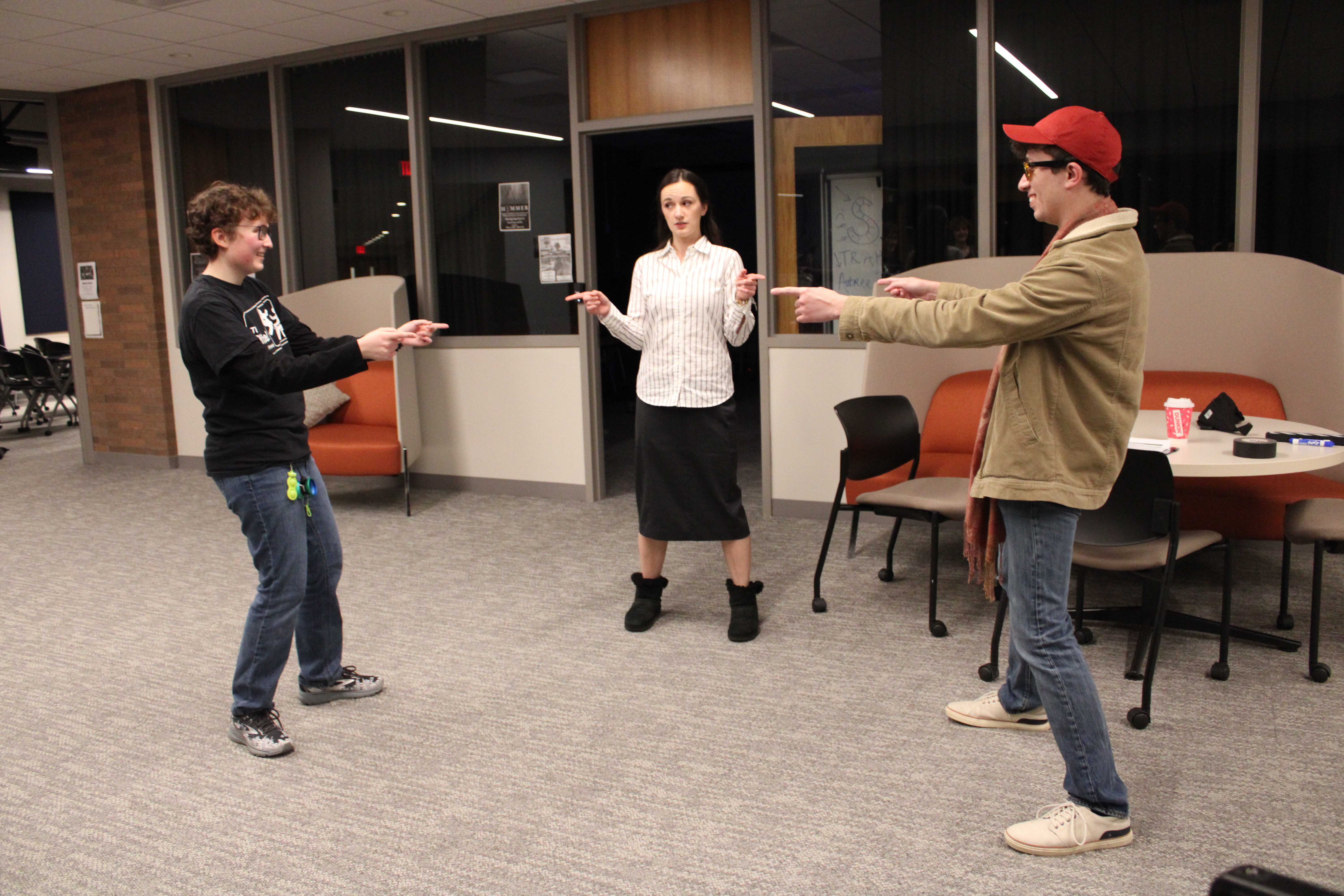 Taylor recreates the Spider-Man pointing meme with an actress and actor.